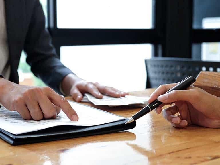 Real Estate Brokers signing an agreement